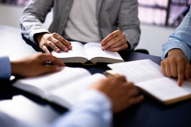 Small group studying the Bible